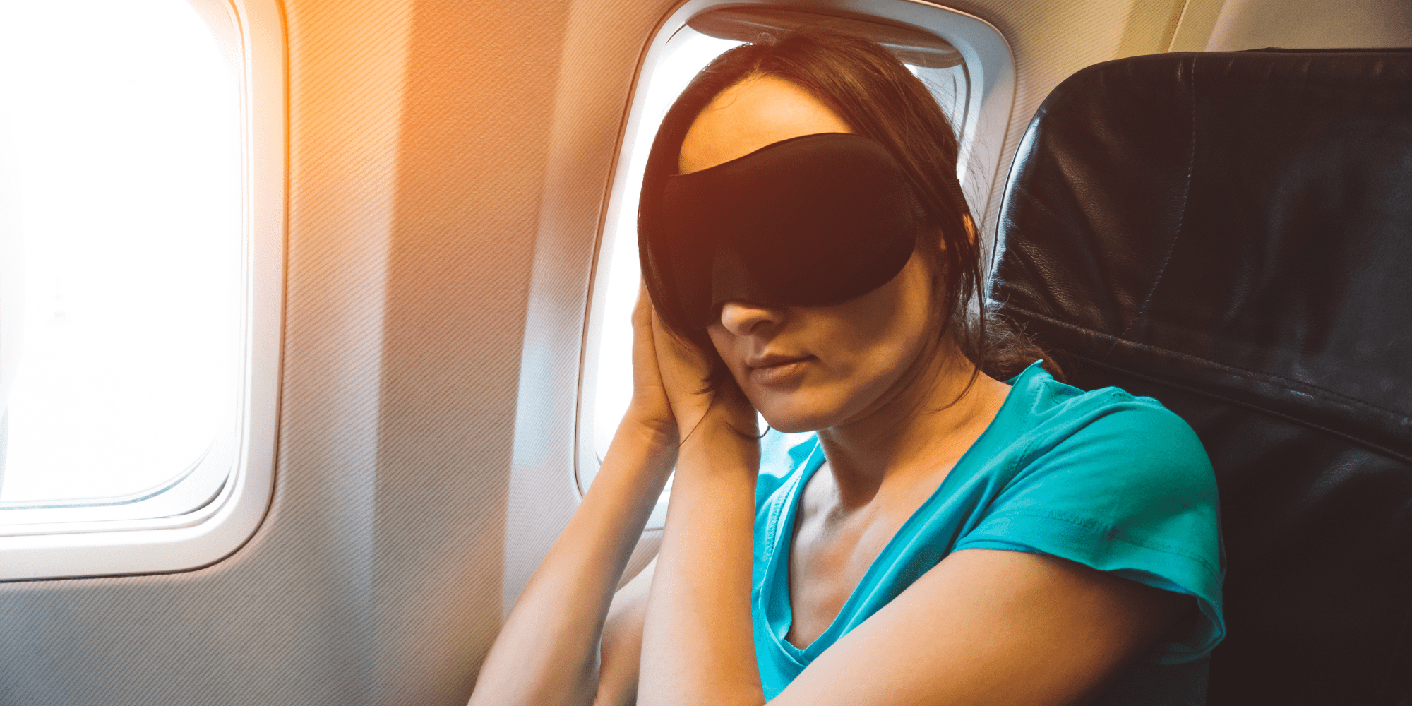 How To Sleep Through a Long Flight With An Eye Mask