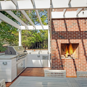 Custom outdoor kitchen with fireplace